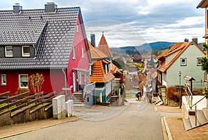 Empty paved street going down in the old town