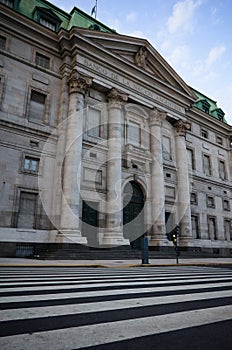 Empty pedestrian crossing near Headquarters of the Bank of the Argentine Nation or Casa Central del Banco de la Nacion Argentina photo