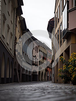 Empty pedestrian streets cobblestone road traditional austrian village old town center Bludenz Vorarlberg Austria