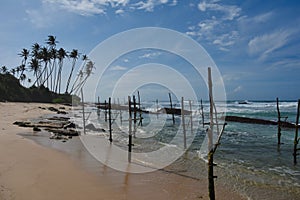 Empty perches for the stick fishermen of Galle