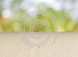 Empty perspective wood over nature blur background