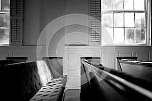 Empty pew bench seating in small church photo