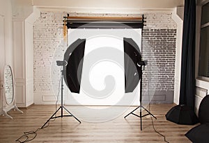 Empty photo studio interior with white background