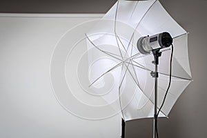 Empty photo studio with lighting equipment