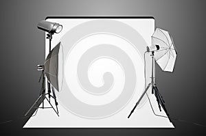 Empty photo studio with lighting equipment