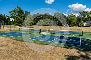 Empty Pickleball court blue and green recreational sport at an outdoor park