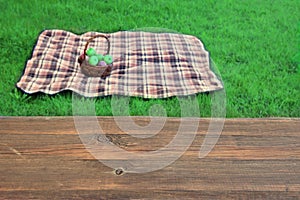 Empty Picnic Table Close-Up Blanket With Basket In The Background