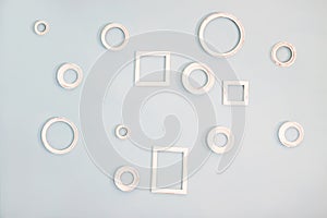 Empty picture frames on the blue wall