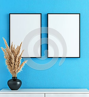 Empty Picture Frames On Light Blue Wall With Dried
