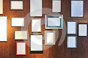 Blank picture frames on a wall gallery photo