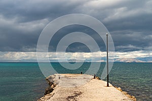 Empty pier in Ionian sea. Greece