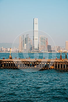 Empty pier with ocean and skyscraper city skyline backgroud, HongKong