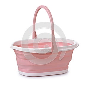 Empty pink collapsible silicone bucket
