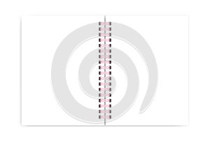 Empty pink spiral notepad spread isolated on white background