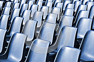 Empty Plastic Chairs at the Stadium