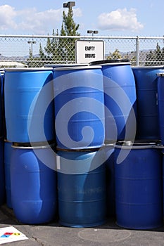 Empty plastic drums for chemicals at a recycling location