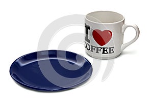 Empty plate and cup isolated on white