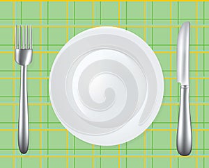 Empty plate with fork and knife