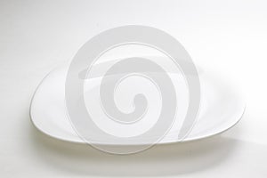 Empty plate. Isolated on white background. View from above