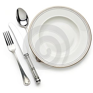 Empty plate with knife, spoon, and fork isolated on white background