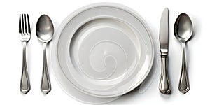 An Empty Plate With A Knife Spoon And Fork Isolated On White