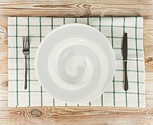 Empty Plate on White Wooden Table Top View with Copy Space