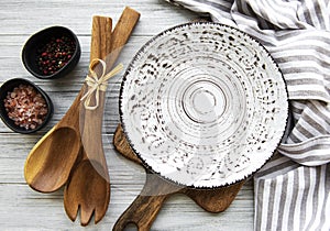 Empty plate on a wooden table