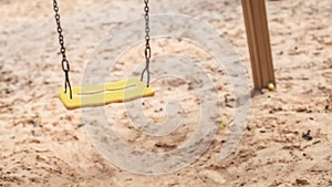 Empty playground swing. concept for child protection, abduction or loneliness
