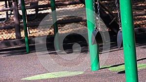 Empty Playground swing set