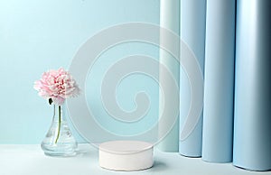 Empty podium for product and fresh peony flowers,elegant beauty conceptStage for product display and business concept.Minimal