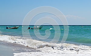 Empty powerboats in the sea in sunny day