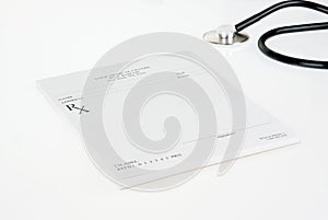 Empty prescription with stethoscope isolated