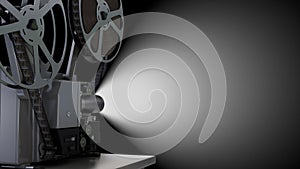 Empty projector screen and spinning film reel with movie on the black background