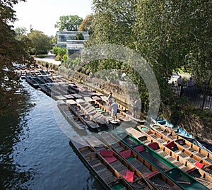 Empty punts floating on the River Cherwell in Oxford, Oxfordshire in the United Kingdom