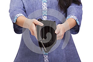 Empty purse in women`s hands