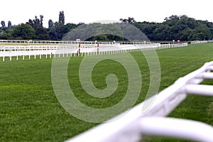 Empty racing track racecourse without horses and riders