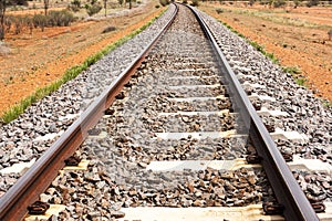 Empty railway through Australian outback. Central Australia