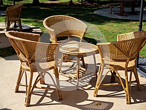 Empty rattan furniture, outdoor garden weave table set.