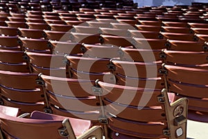 Empty raws of red chairs outside. Empty raws of red chairs outside. Covid-19 quarantine