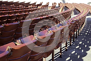 Empty raws of red chairs outside. Empty raws of red chairs outside. Covid-19 quarantine