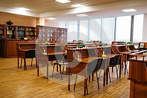 Empty reading room, tables in library, nobody