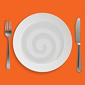 Empty realistic dinner plate, knife and fork