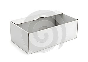 Empty rectangular cardboard box sitting on a plain background