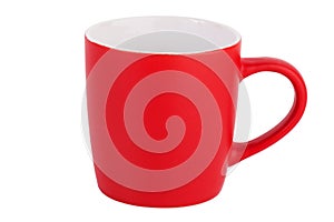 An empty red ceramic mug