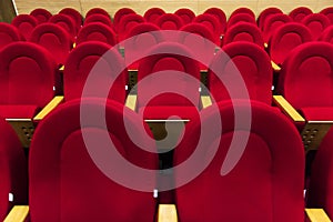 Empty red chairs. Chairs of cinema, theatre, auditorium