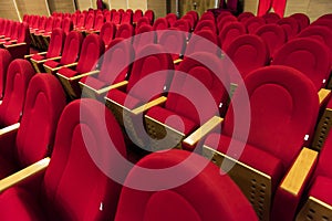 Empty red chairs. Chairs of cinema, theatre, auditorium