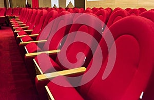 Empty red chairs. Chairs of cinema, theatre, auditorium