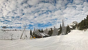 Empty red piste on Strbske pleso, Solisko ski resort photo