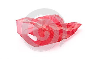 Empty red plastic bag isolated on white background
