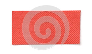 Empty red plastic perforated packaging underlayment